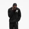 Stickad bouclé-polo
