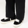 Tvålagers sweatpants med broderat tryck